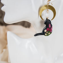  florals on black cat under brass moon polymer clay earrings with moonstone dangles