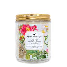  lolita salted caramel and pistachio Scoopable coconut apricot wax melt whipped into a clear glass jar with a gold lid and spoon a pleasant thought