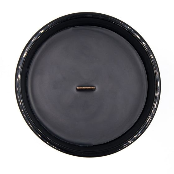 raven black wax candle wood wick top view