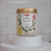 best wishes birthday cake Scoopable coconut apricot wax melt whipped into a clear glass jar with a gold lid and spoon