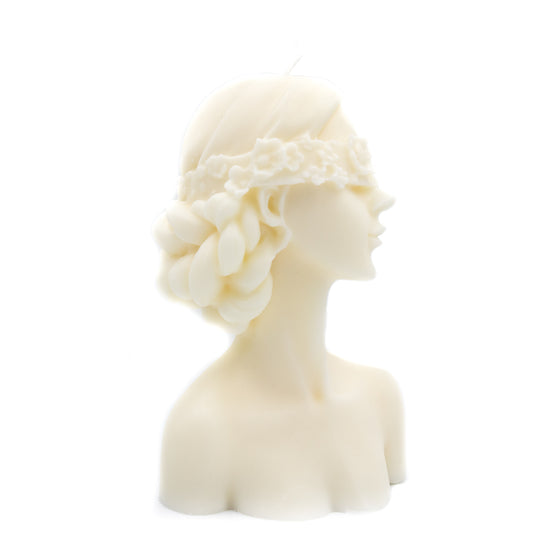 Blindfolded woman pillar candle side