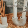 round incense holder concrete in use