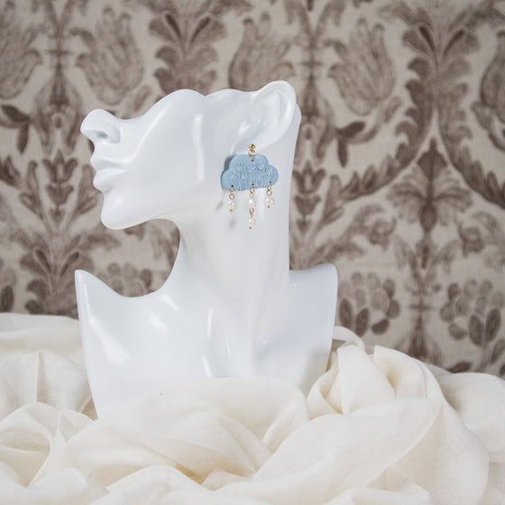hellebore floral on pale blue cloud polymer clay earrings with freshwater pearls dangles monochromatic model