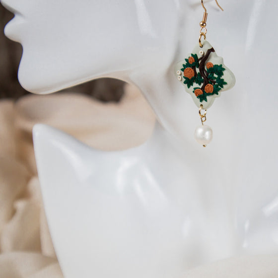 orange branches on sage polymer clay earrings with freshwater pearl dangle