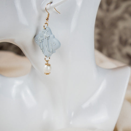 peonies on pale blue polymer clay earrings with freshwater pearl dangles monochromatic