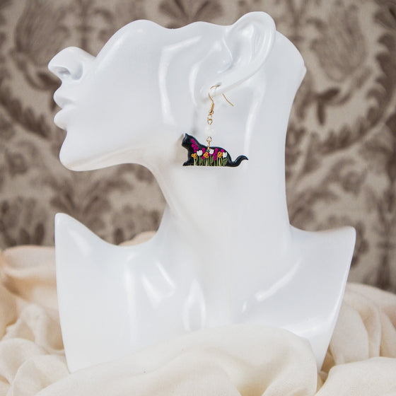florals on black cat polymer clay earrings with moonstone dangles model