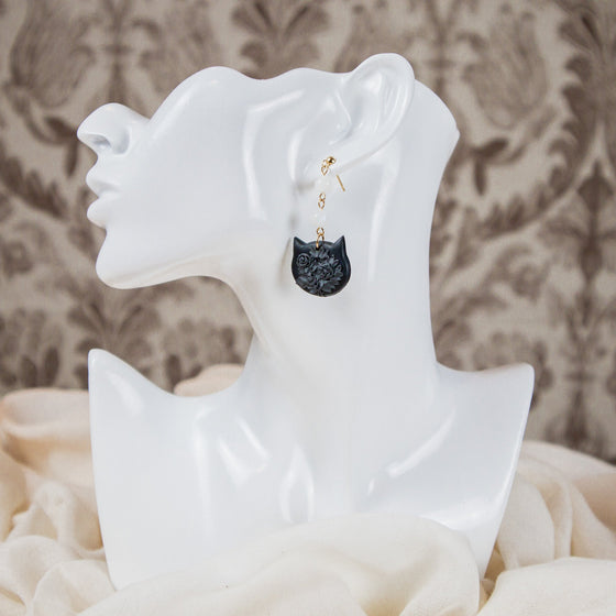 florals on black cat face polymer clay earrings with moonstones dangles monochromatic model
