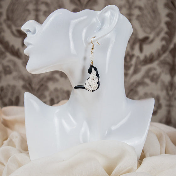 white florals on black cat polymer clay earrings with moonstone dangles model