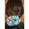 big scrunchie white with blue and gold florals on hair