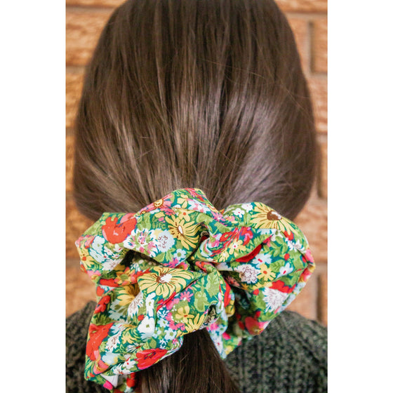 big scrunchie green with florals Liberty of London on hair