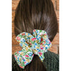 big scrunchie white with florals Liberty of London on hair