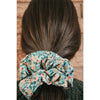 big scrunchie blue with florals on hair