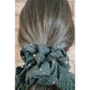 big scrunchie black with gold stars on hair