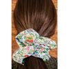 big scrunchie aqua with florals Liberty of London on hair