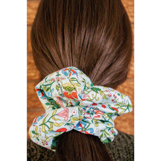 big scrunchie aqua with florals Liberty of London on hair
