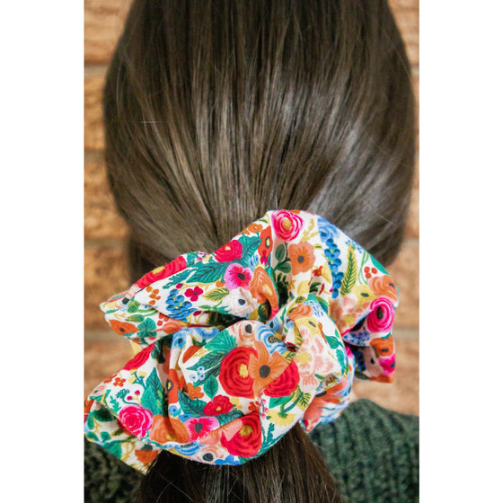 big scrunchie white with florals and blueberries on hair