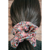 big scrunchie mulberry with pink and gold florals on hair