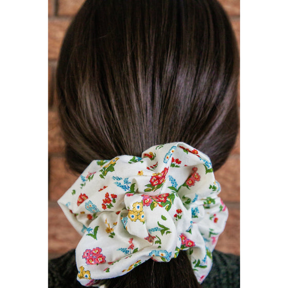 big scrunchie white with florals Liberty of London on hair