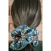 big scrunchie dark blue with florals and quails on hair