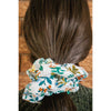 big scrunchie pale blue with florals on hair