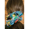 big scrunchie black with florals and blueberries on hair