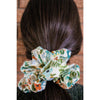 big scrunchie ivory with florals and berries on hair