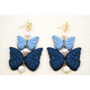 florals on shades of blue butterflies polymer clay earrings with freshwater pearls dangles monochromatic