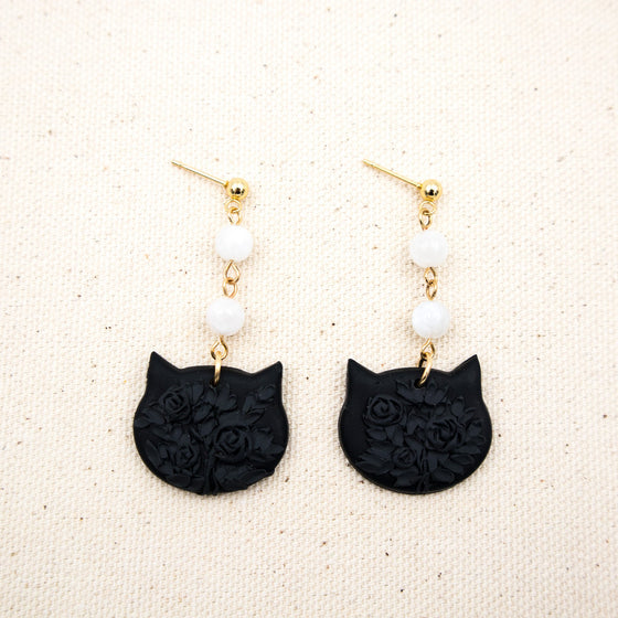 florals on black cat face polymer clay earrings with moonstones dangles monochromatic