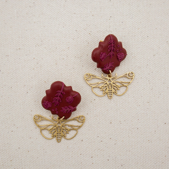 butterfly on mulberry quatrefoil polymer clay earrings dangles monochromatic