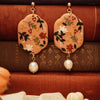 dahlias and florals on pink polymer clay earrings with freshwater pearl dangle