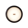 samsara spiced sandalwood coconut apricot wax candle in a classic, amber glass jar with a wooden wick and lid top
