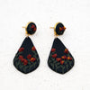     IMG_6020  800 × 800px  Polymer clay earrings red amaryllis flowers on black teardrop dangles