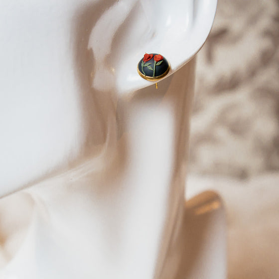     IMG_6020  800 × 800px  Polymer clay earrings red amaryllis flowers on black teardrop dangles just studs