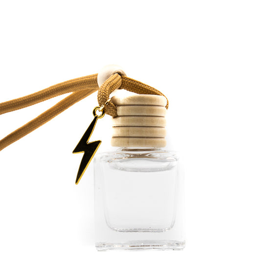 wizardly lightning bolt Fragranced car or locker diffuser oil housed in a clear rectangular glass bottle with a wooden top, and cord a pleasant thought