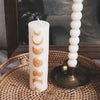Golden Moon Phases Candle Pillar in use