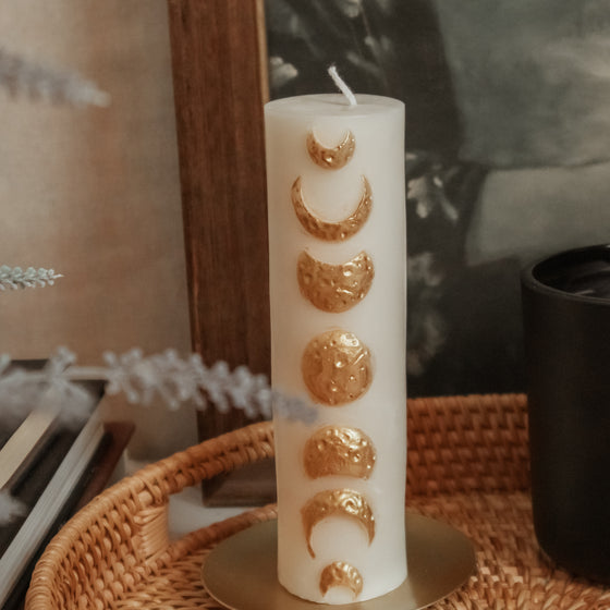 Golden Moon Phases Candle Pillar displayed