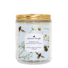 ophelia peach blossom and basil Scoopable coconut apricot wax melt whipped into a clear glass jar with a gold lid and spoon a pleasant thought