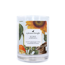  eyre wildflowers coconut apricot wax candle in a clear glass vessel with a wooden wick a pleasant thought