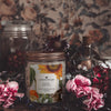 eyre wildflowers Scoopable coconut apricot wax melt whipped into a clear glass jar with a gold lid and spoon notes