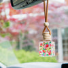 handpainted flowers car diffuser in use