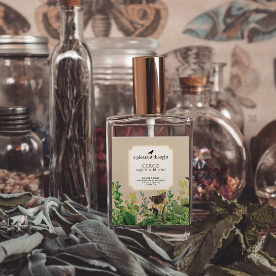circe sage and wild mint Fragranced room and linen spray housed in a decorative glass bottle with a gold lid notes