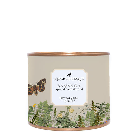 samsara spiced sandalwood soy wax melts housed in an antique gold tin a pleasant thought
