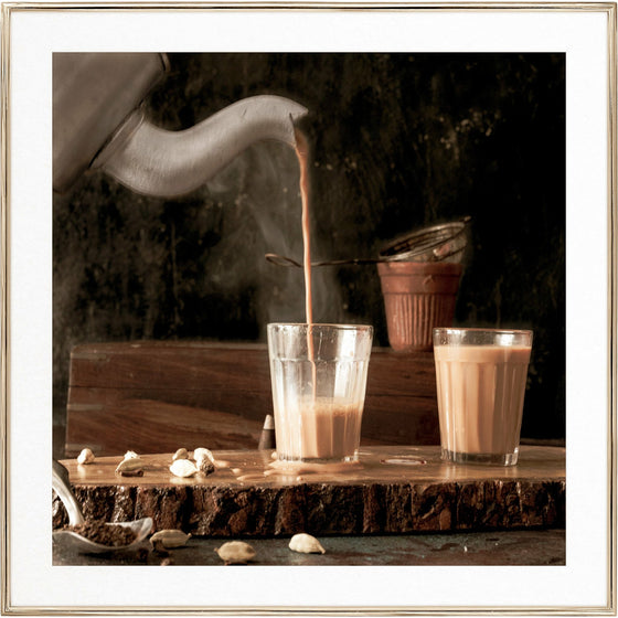 ceylon milk tea inspiration for pal tenir ceylon milk tea coconut apricot wax candle in a classic, clear glass votive with a wooden wick tamil candle